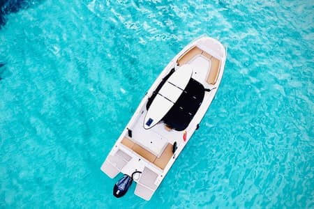 Privéboottocht vanuit Palma met snorkelen en peddelsurfen