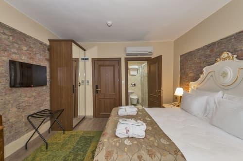 By Murat Royal Hotels, Room