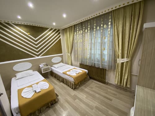 Grand Oral Hotel, Room